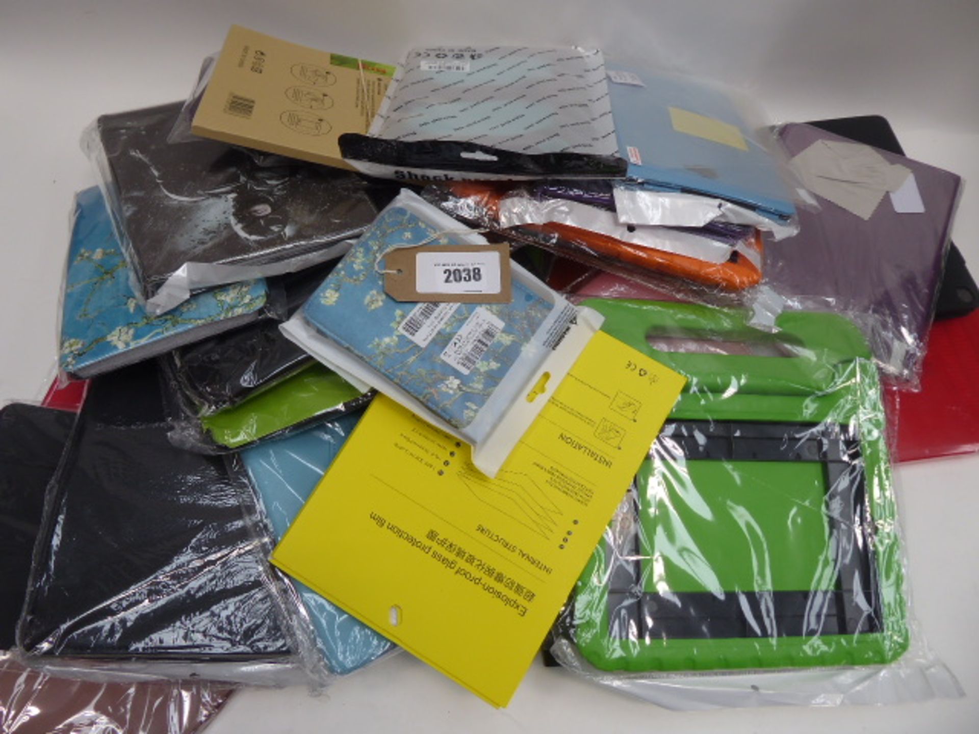 Bag containing quantity of various tablet cases and covers