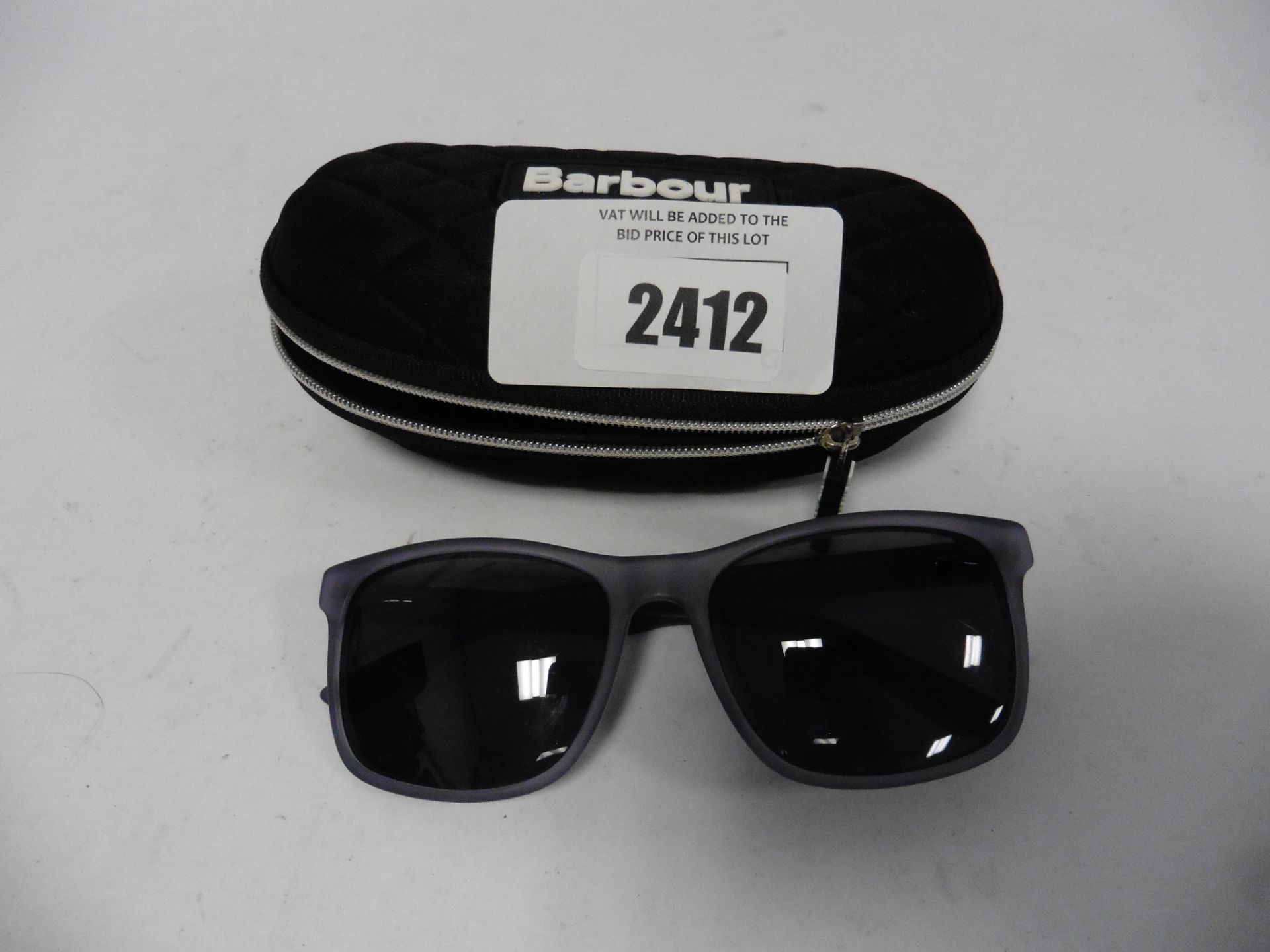 Pair Barbour Polarized sunglasses with case