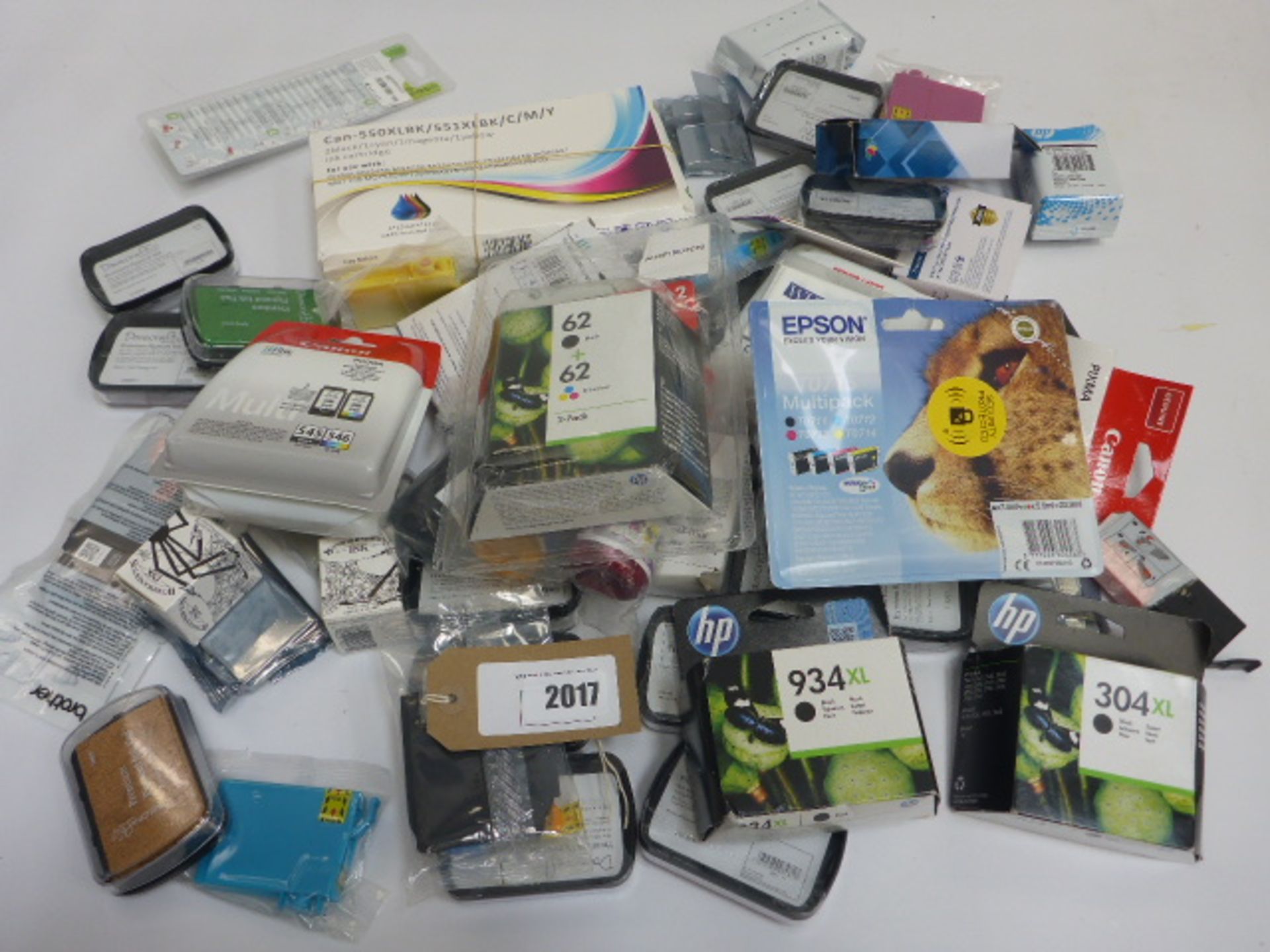 Bag containing various branded and unbranded printer ink cartridges