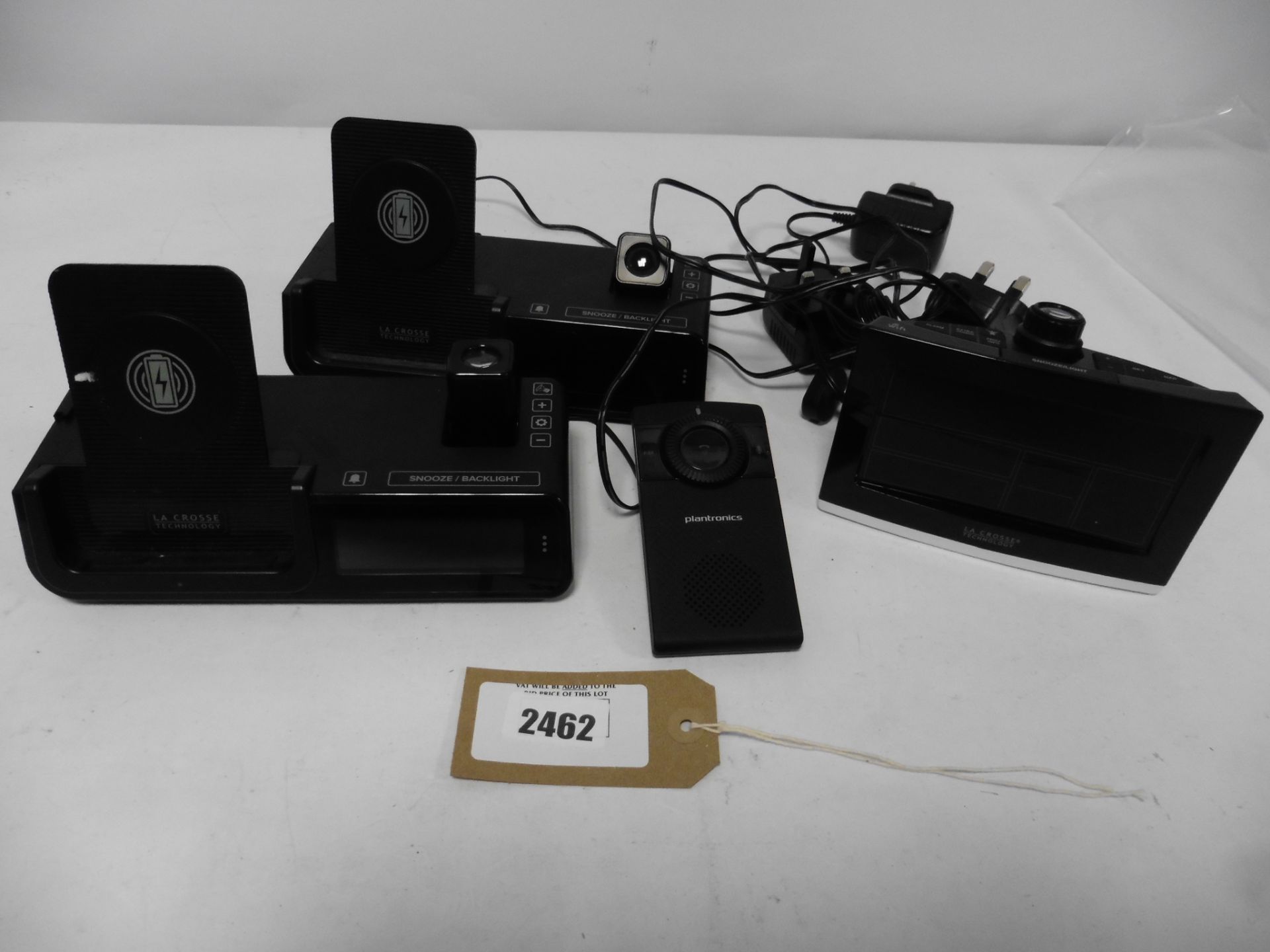 3 various projection alarm clocks and a Plantonics K100 speaker