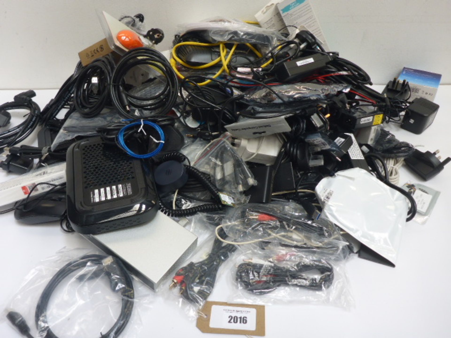 Large bag containing quantity of electrical related accessories and devices; hubs, PSUs, cables,