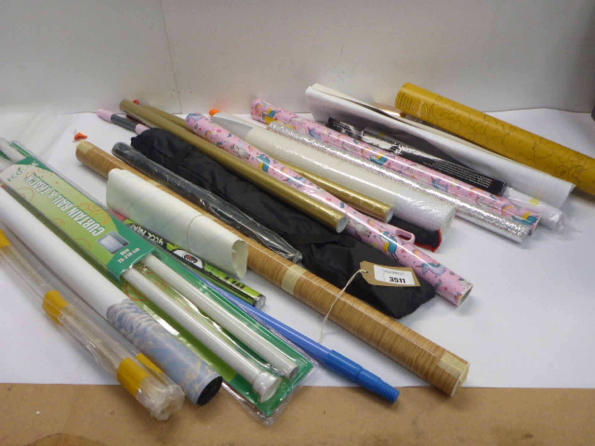 Gift wrap, scratch map, curtain rail & track, feathers, tripod, sticky back plastic, broom handles
