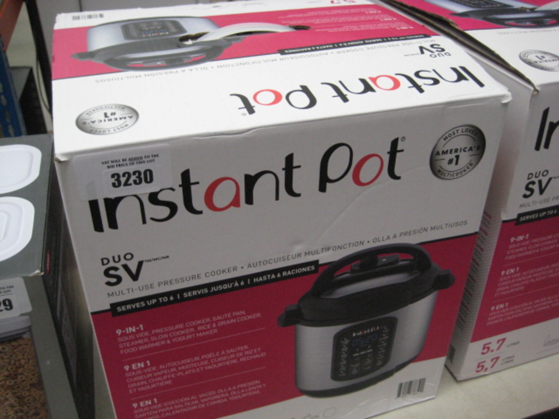 Boxed Instant Pot multi use pressure cooker