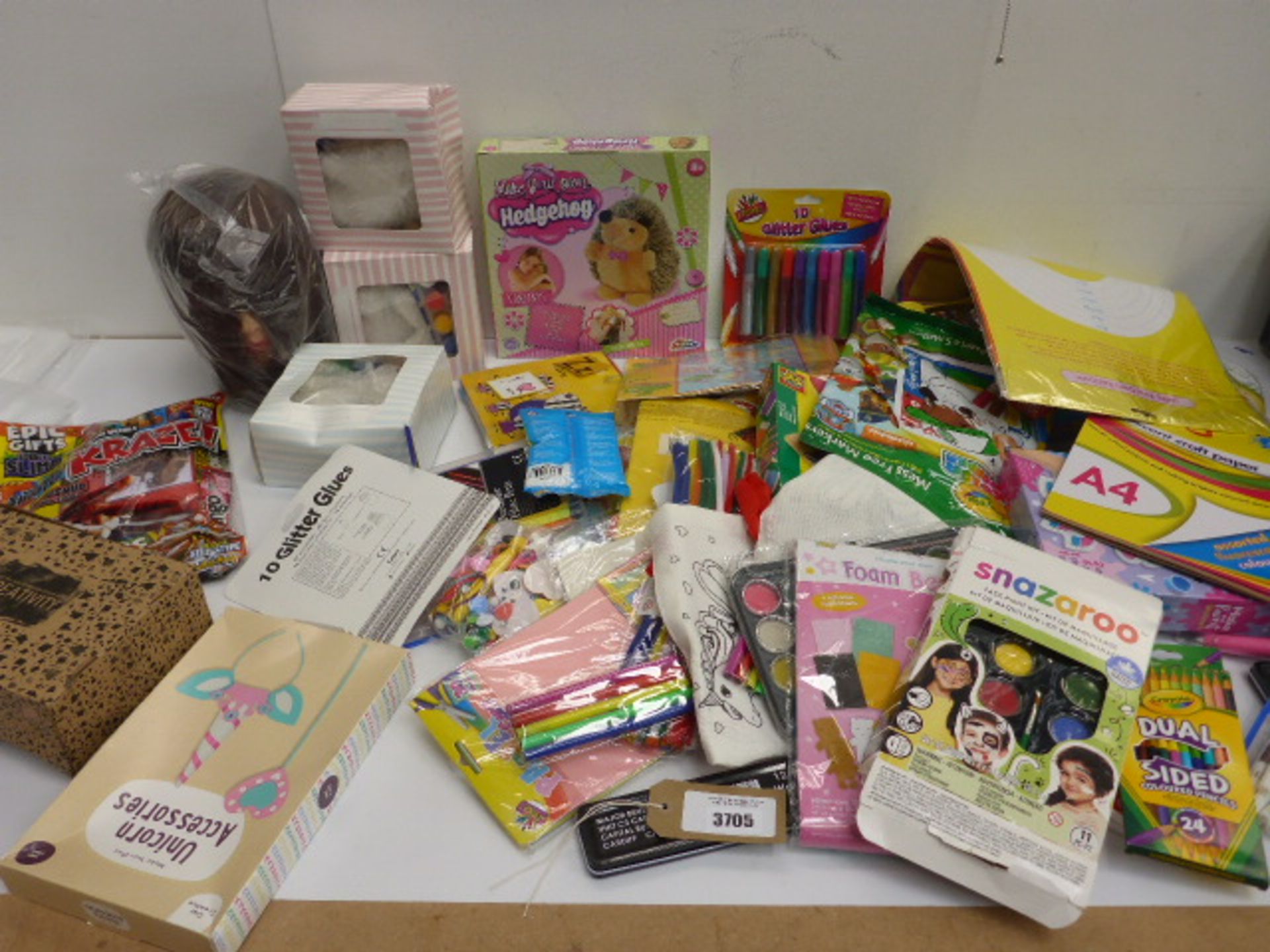 Glitter glue, colouring pens, pencils, Sketch pad, craft packs, activity magazines, paints,