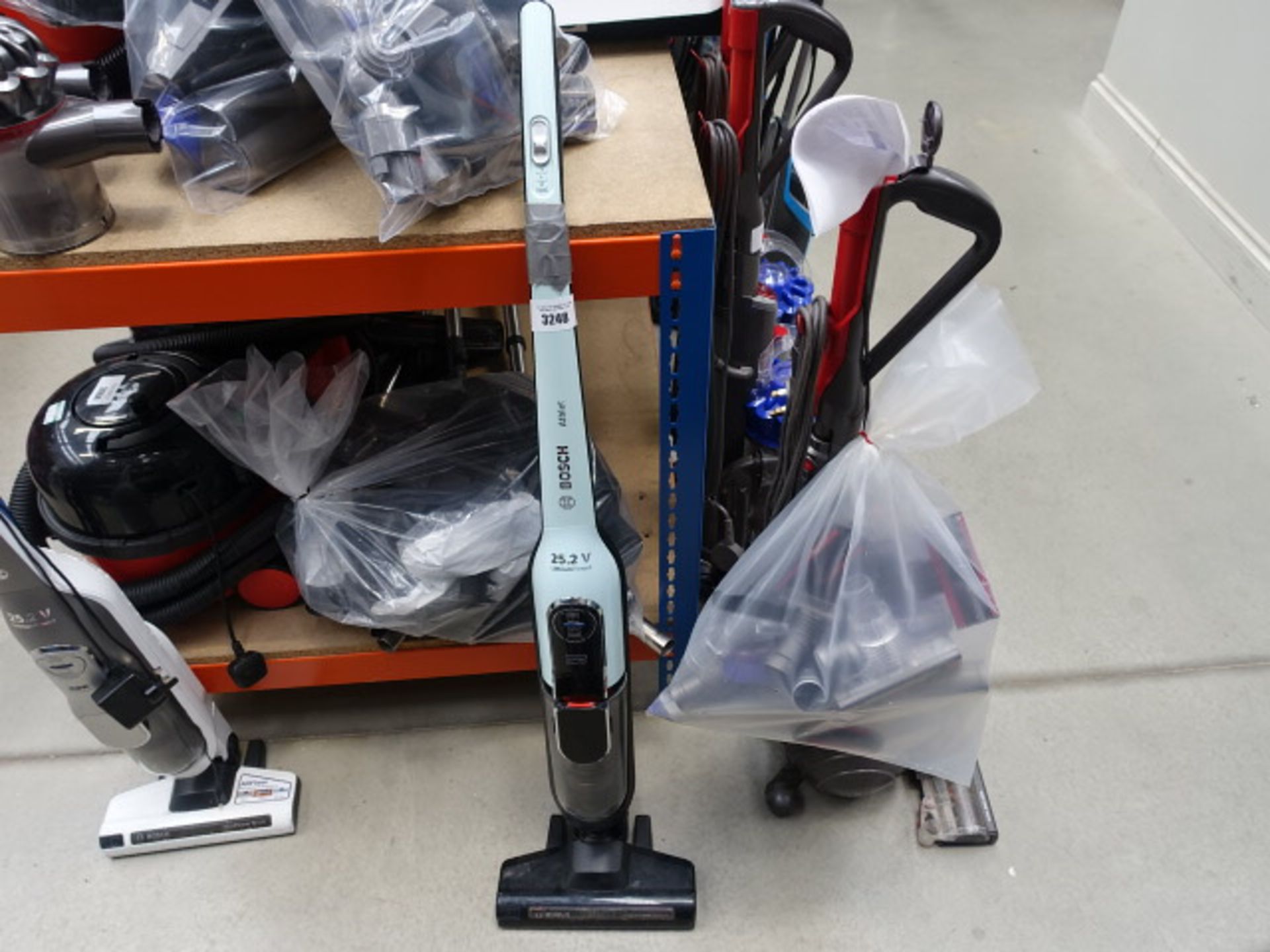 Upright cordless Bosch vacuum cleaner with broken handle plus no charger