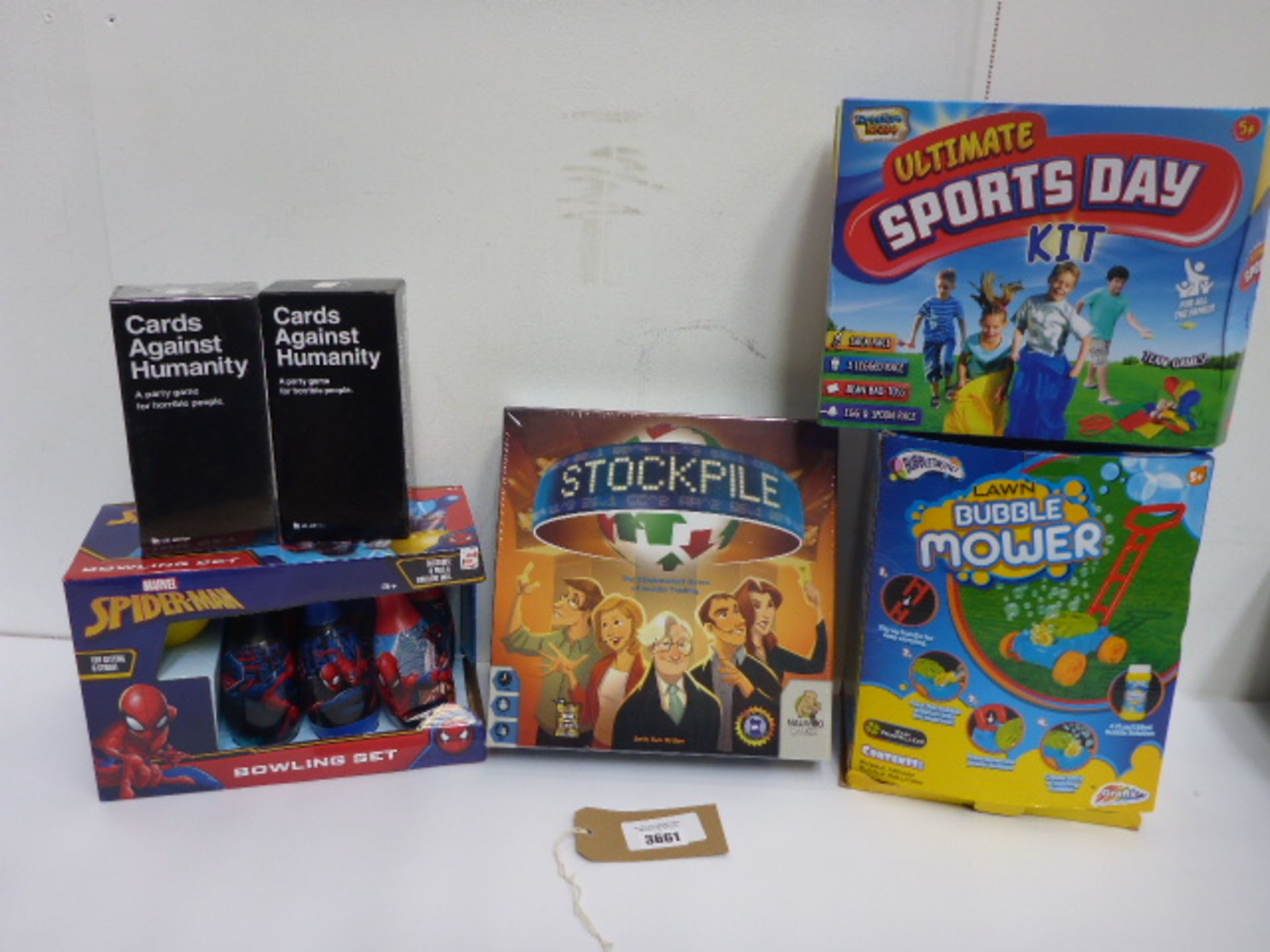 2 x Cards Against Humanity, Spider-man bowling set, Stockpile board game, Bubble Mower and