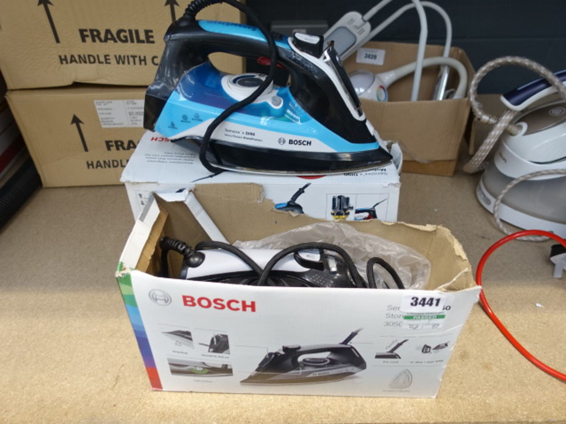 2 boxed Bosch steam irons