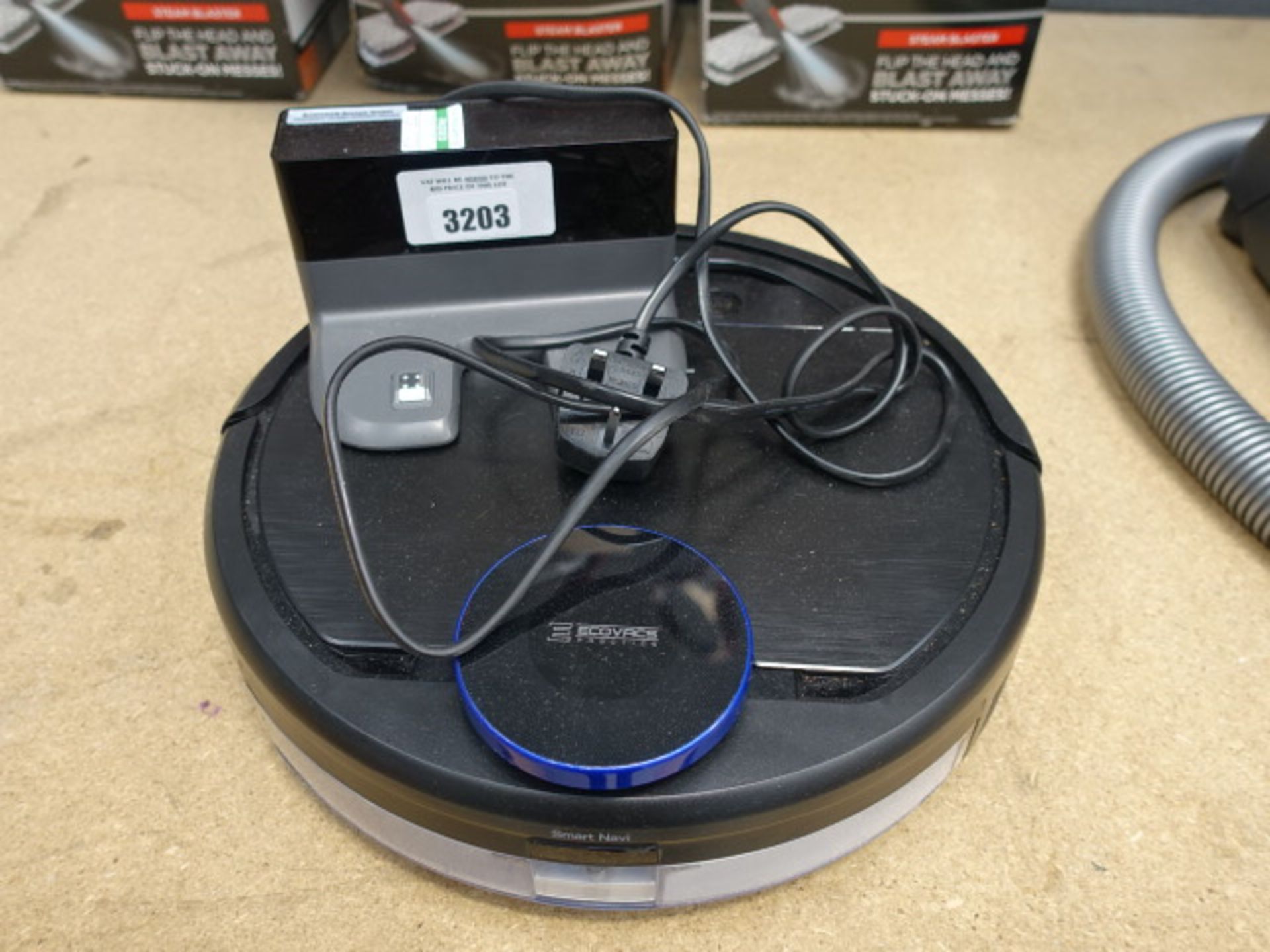 Unboxed Deebot 930 vacuum cleaning robot with charger
