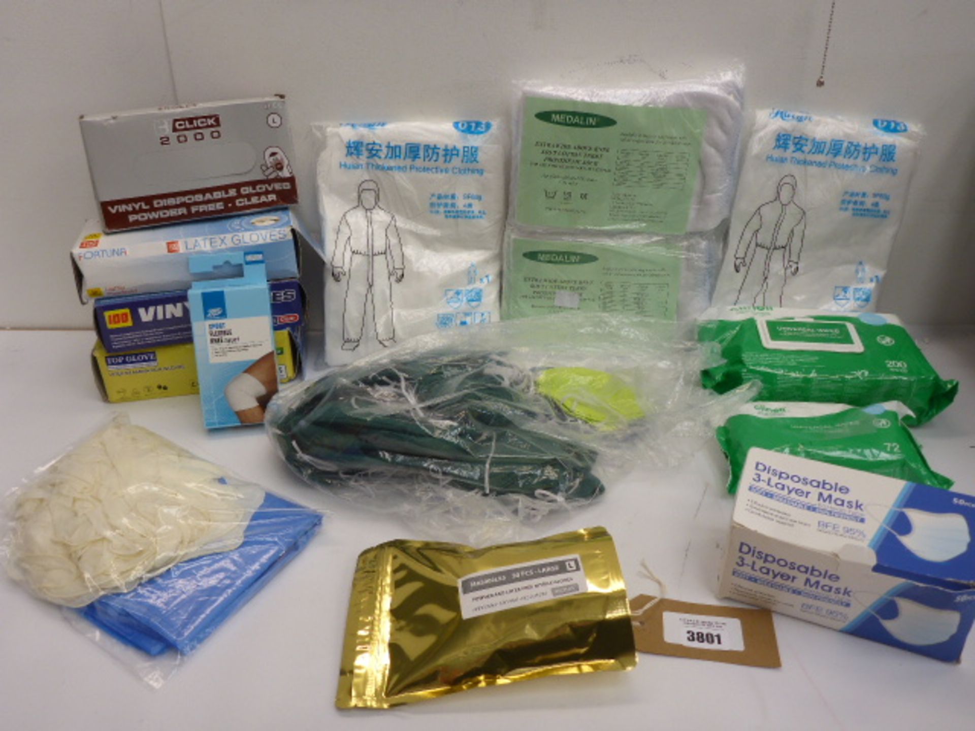 Quantity of examination gloves and face masks, protective coveralls, Universal wipes, prosthetic