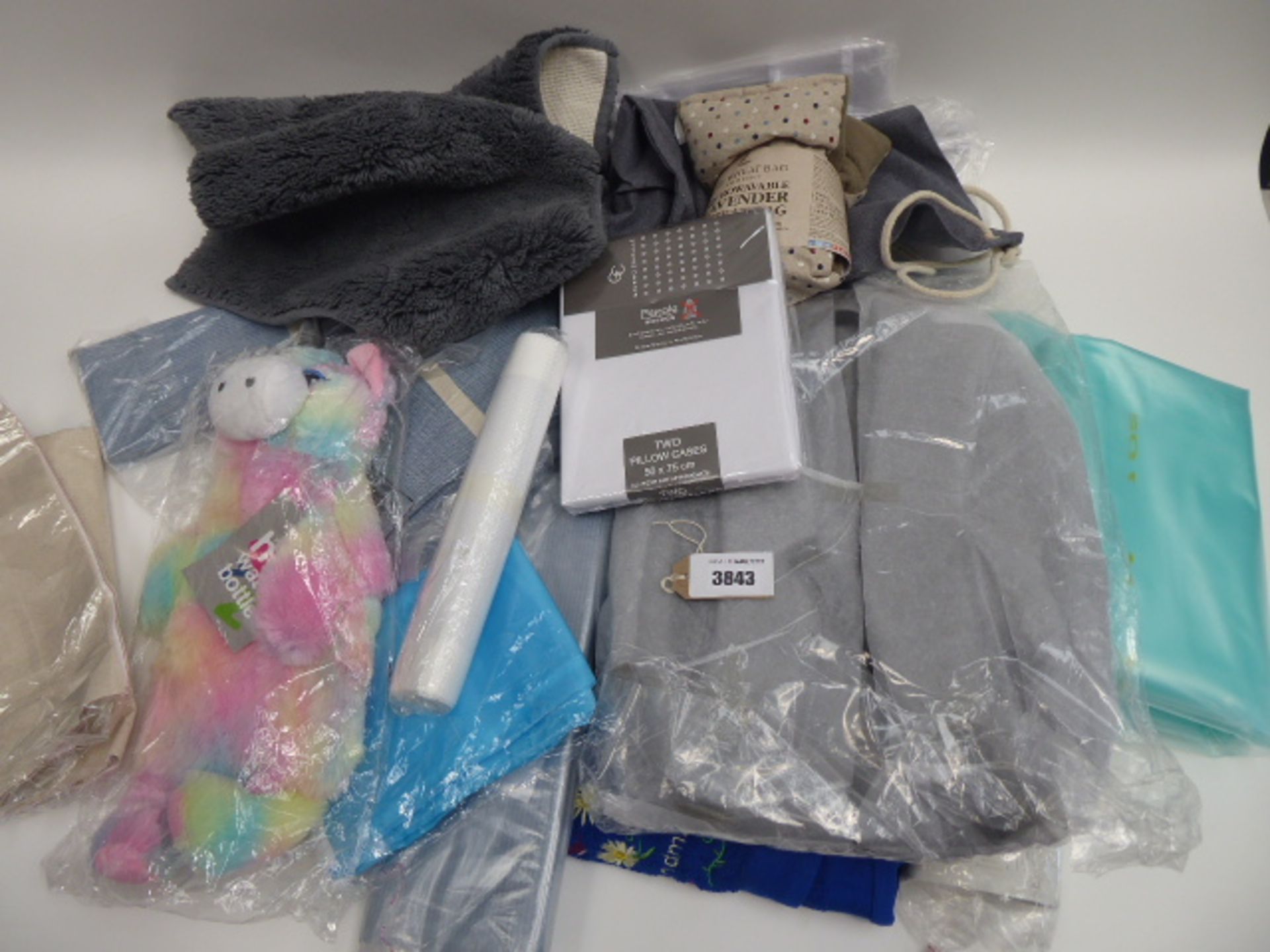 Bag containing quantity of various fabrics/materials, bags, towels, mats etc