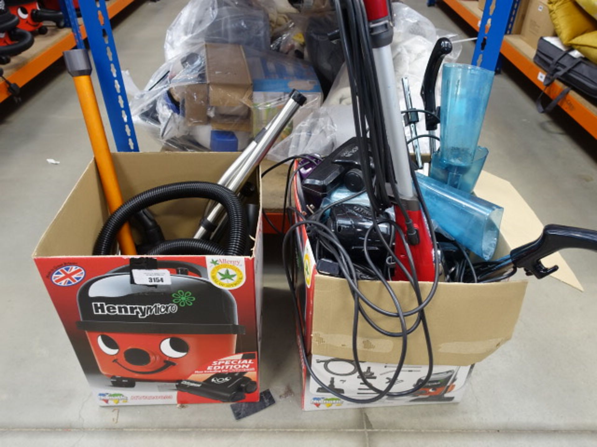 2 boxes containing Henry vacuum cleaner accessories, Sharp steam mop, mini vacuum cleaners, etc