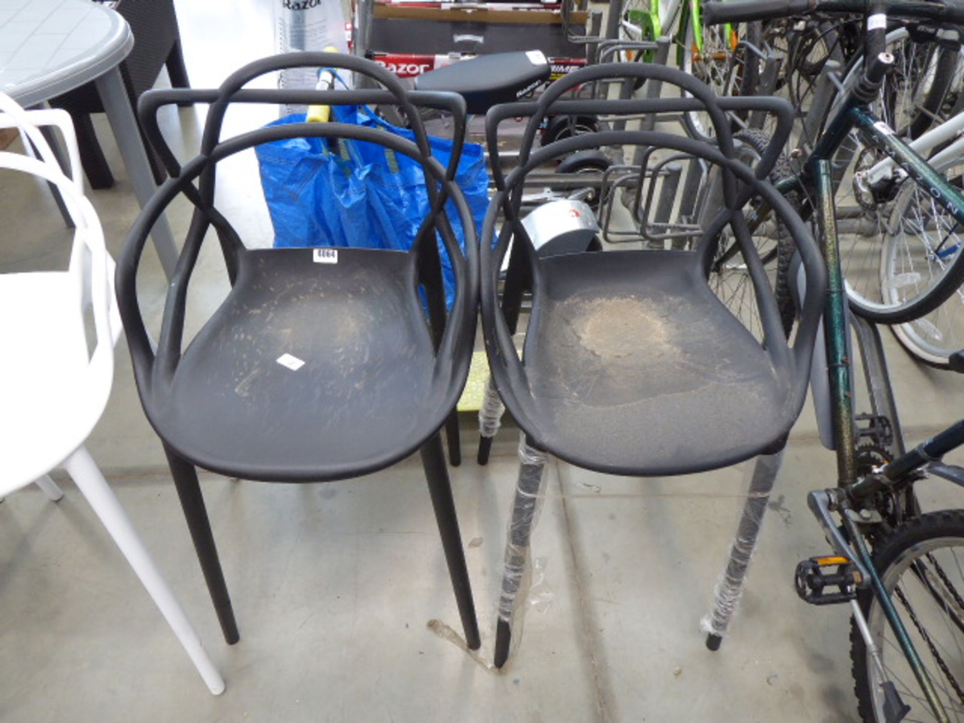 2 black low bar stools