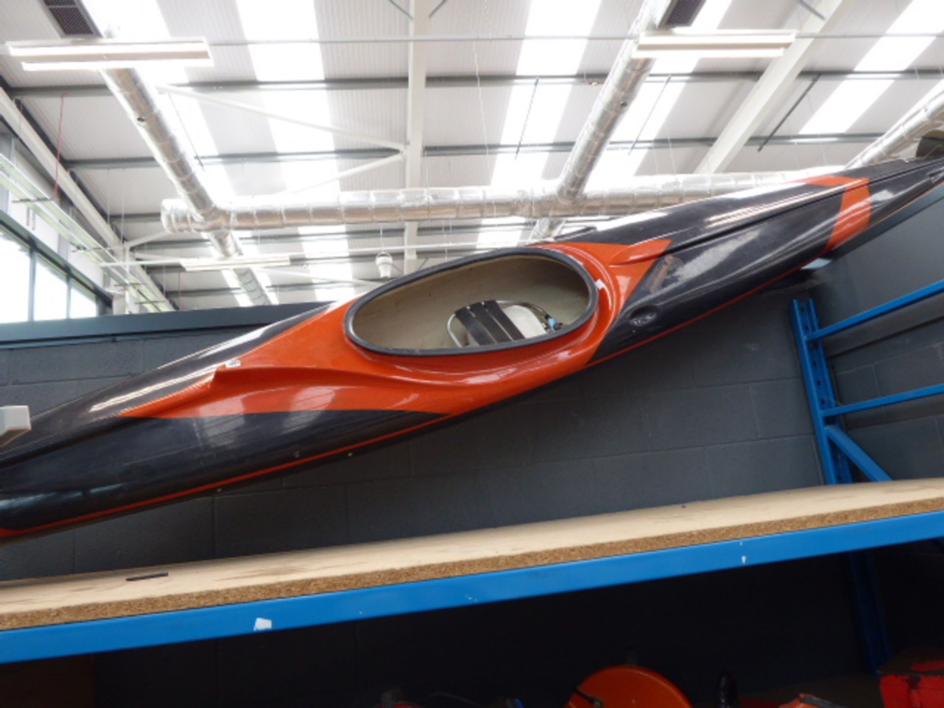 Large orange and black canoe