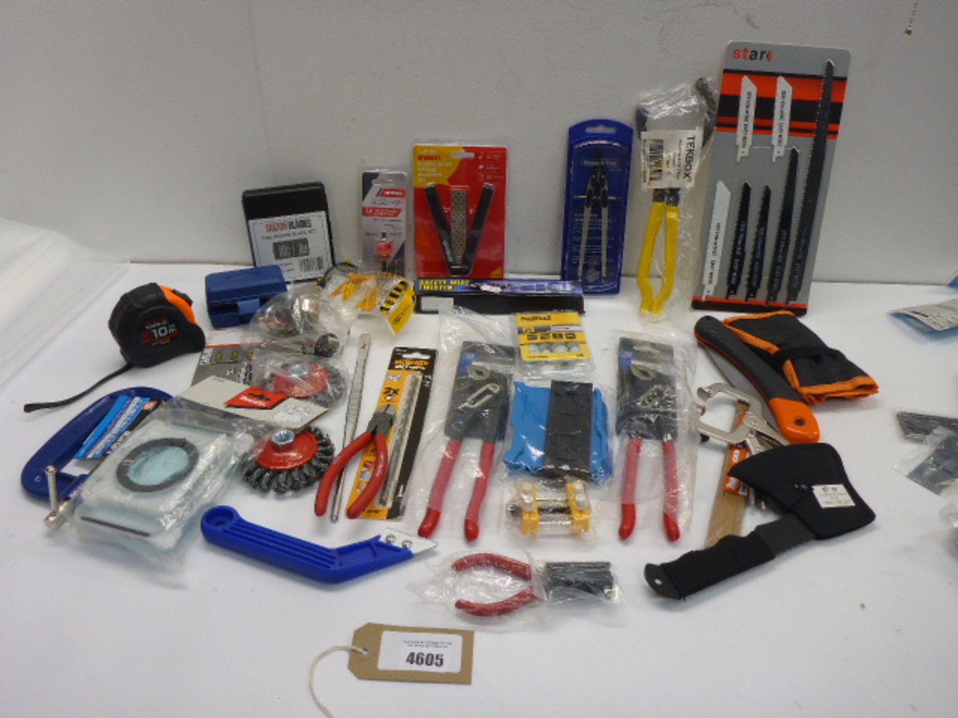 DeWalt safety goggles, water pump pliers, saw blades, fixings, G clamps, mini hatchet, drill bits