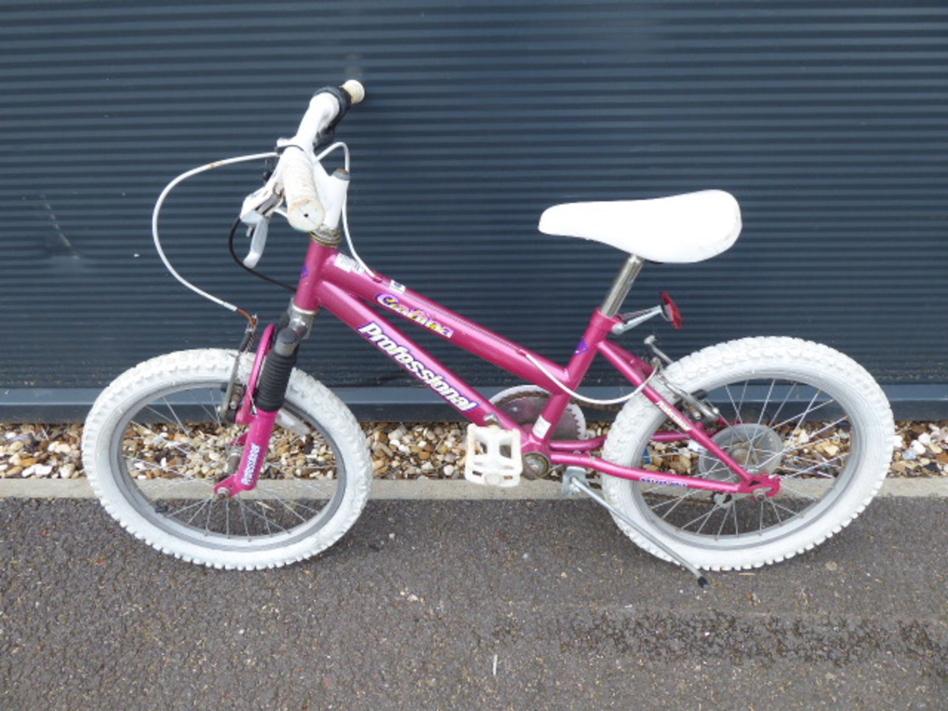 Small pink child's cycle
