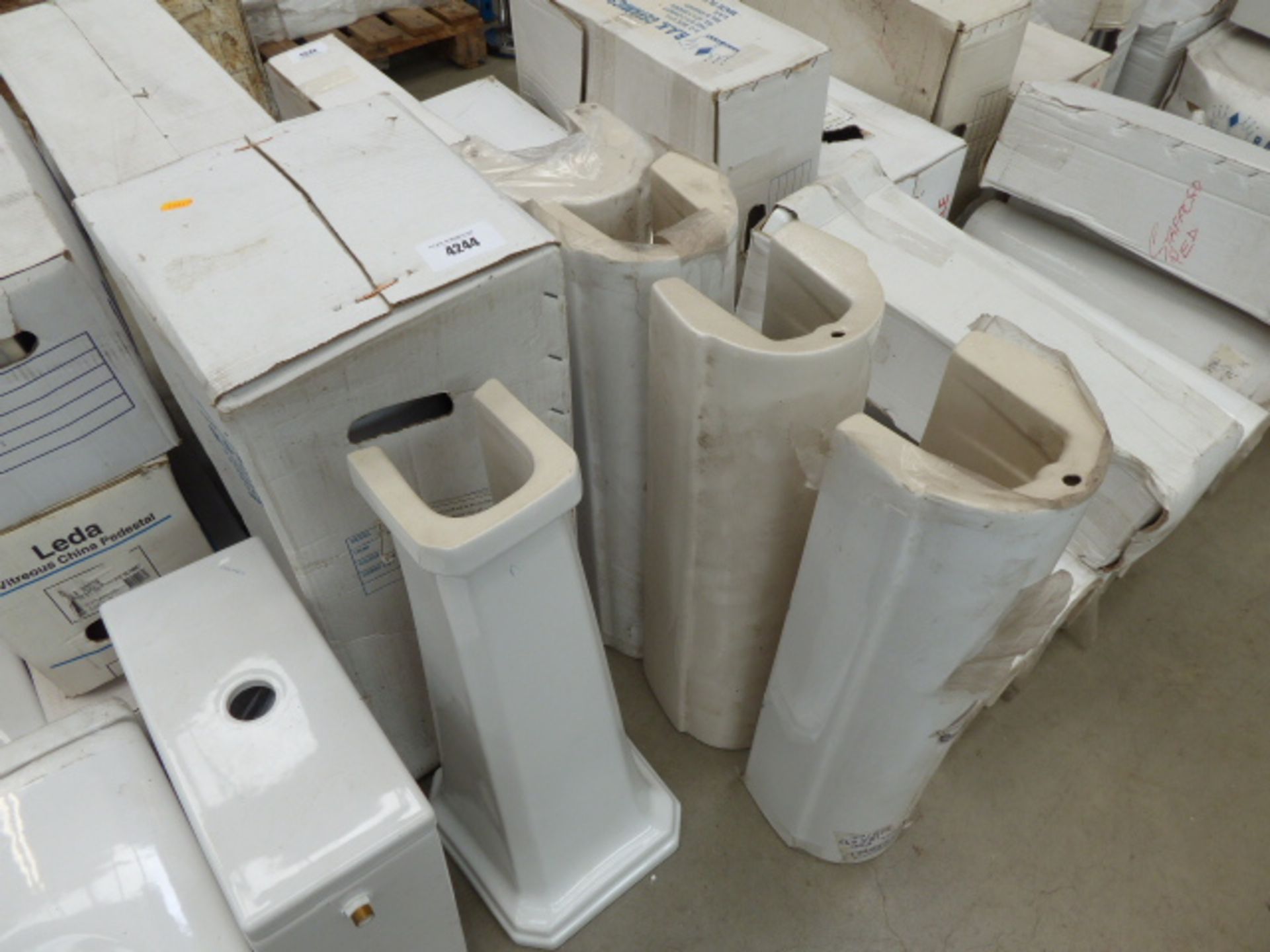 3 boxed and 14 unboxed sink pedestals