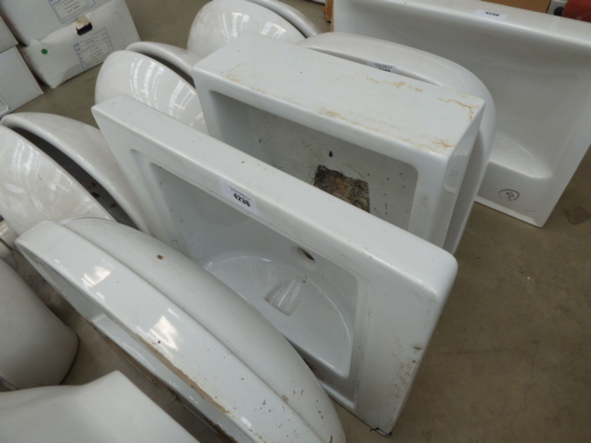 1 large square wash basin and a butler style sink