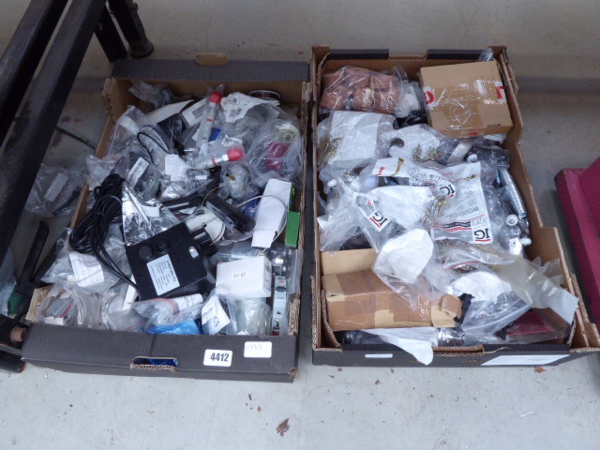 2 boxes containing springs, clips, screws, washers, coat hooks, electrical switches, etc