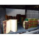 Cage containing a qty of poetry books and the works of Scott