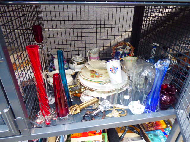 Cage containing corkscrews, brassware, bunnykins and other plates, glassware and a Staffordshire