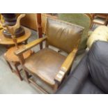Oak brown leather armchair with exposed frame