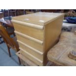 Maple finished four-drawer bedside cabinet