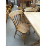 Four beech stickback dining chairs