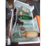 Box containing ginger beer bottle plus glass bottles