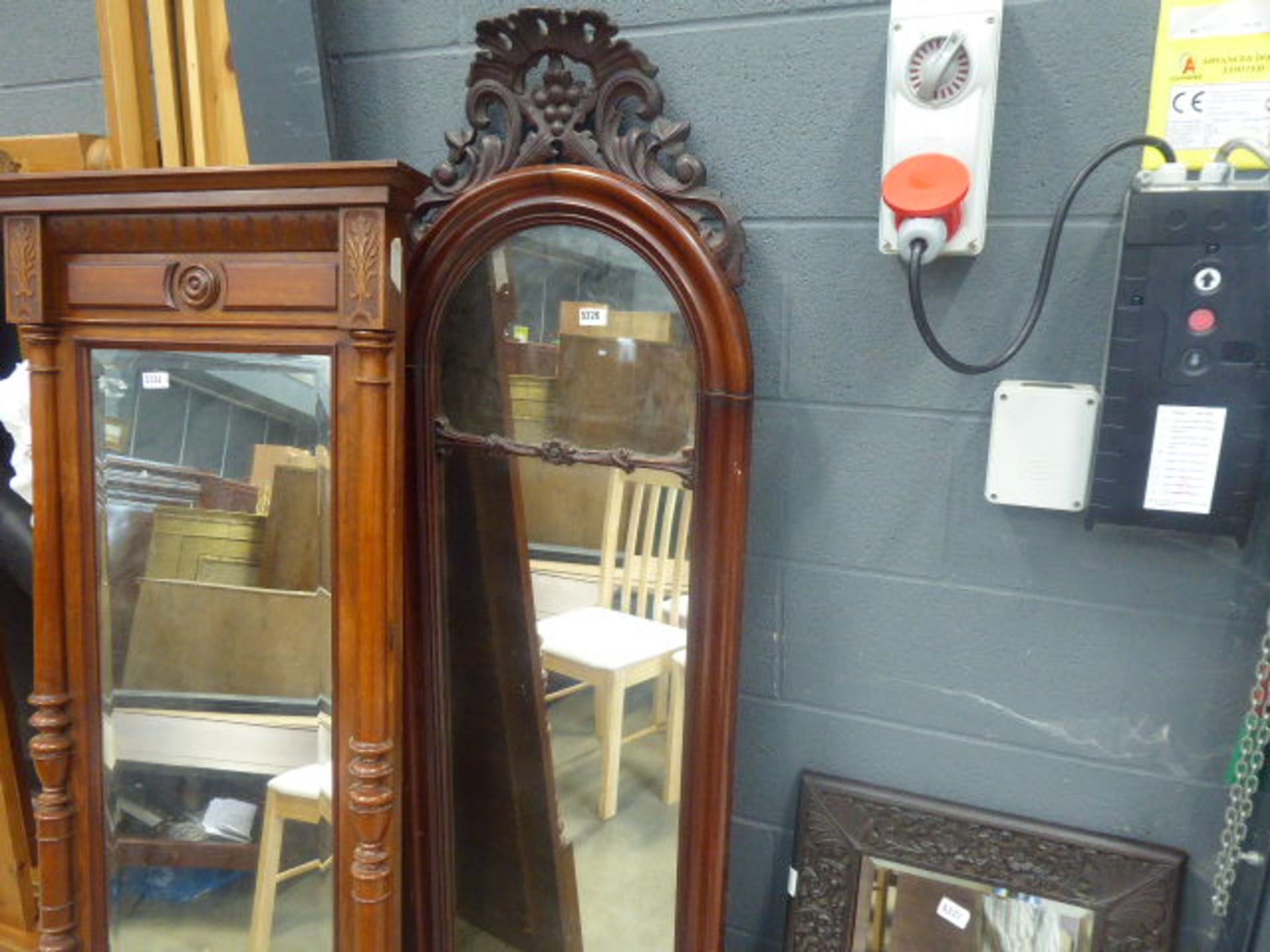 Dome topped mirror in dark wood frame