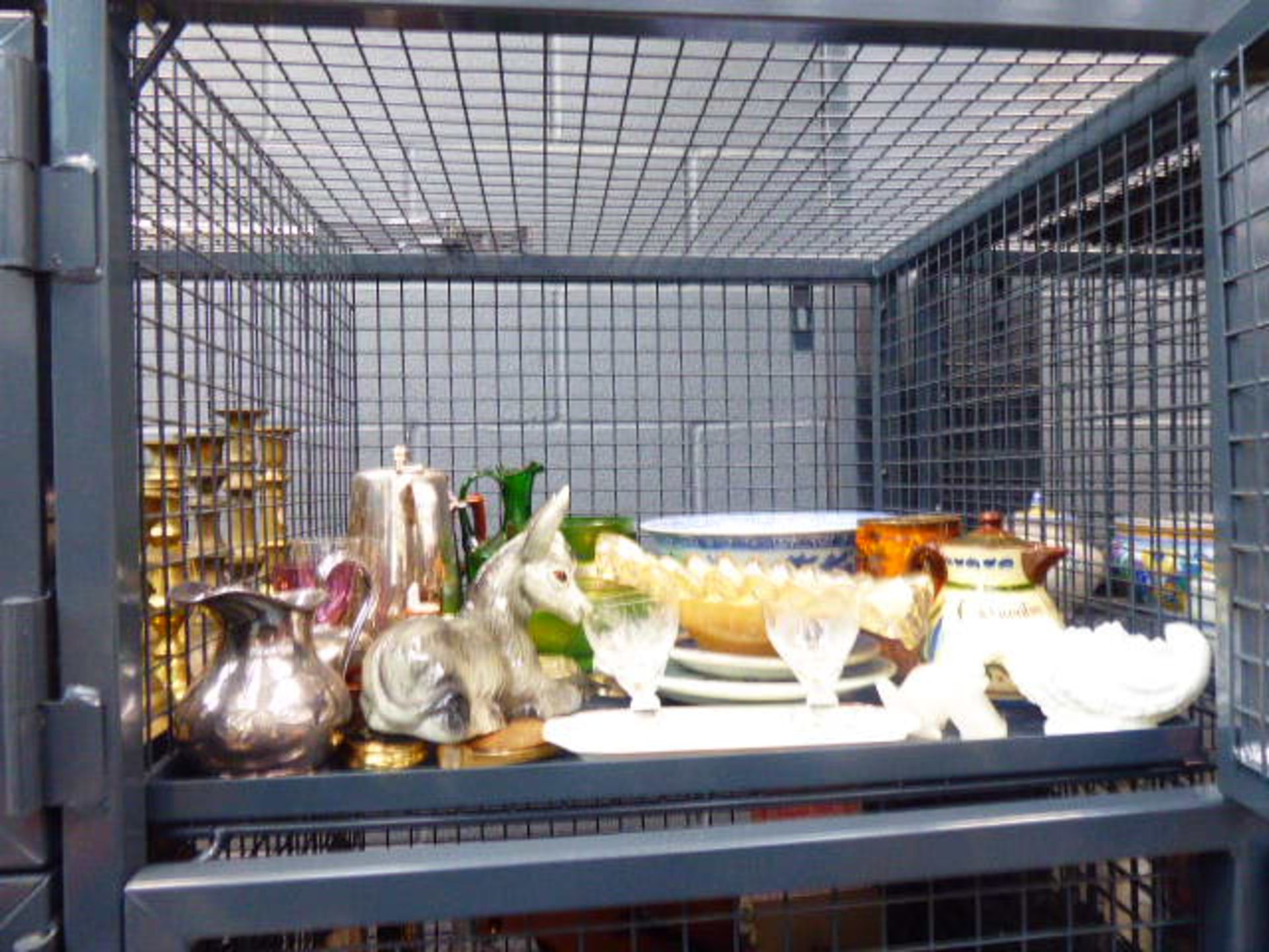 Cage containing an ornamental donkey, hotel plate, blue and white china, plus glassware