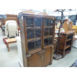 Glazed oaked double-door bookcase with cupboard under