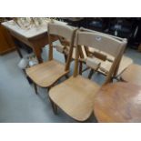 Four beech bar-back dining chairs