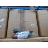 Box containing a quantity of painted wooden ducks