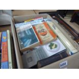 Box containing reference books, autobiographies and novels