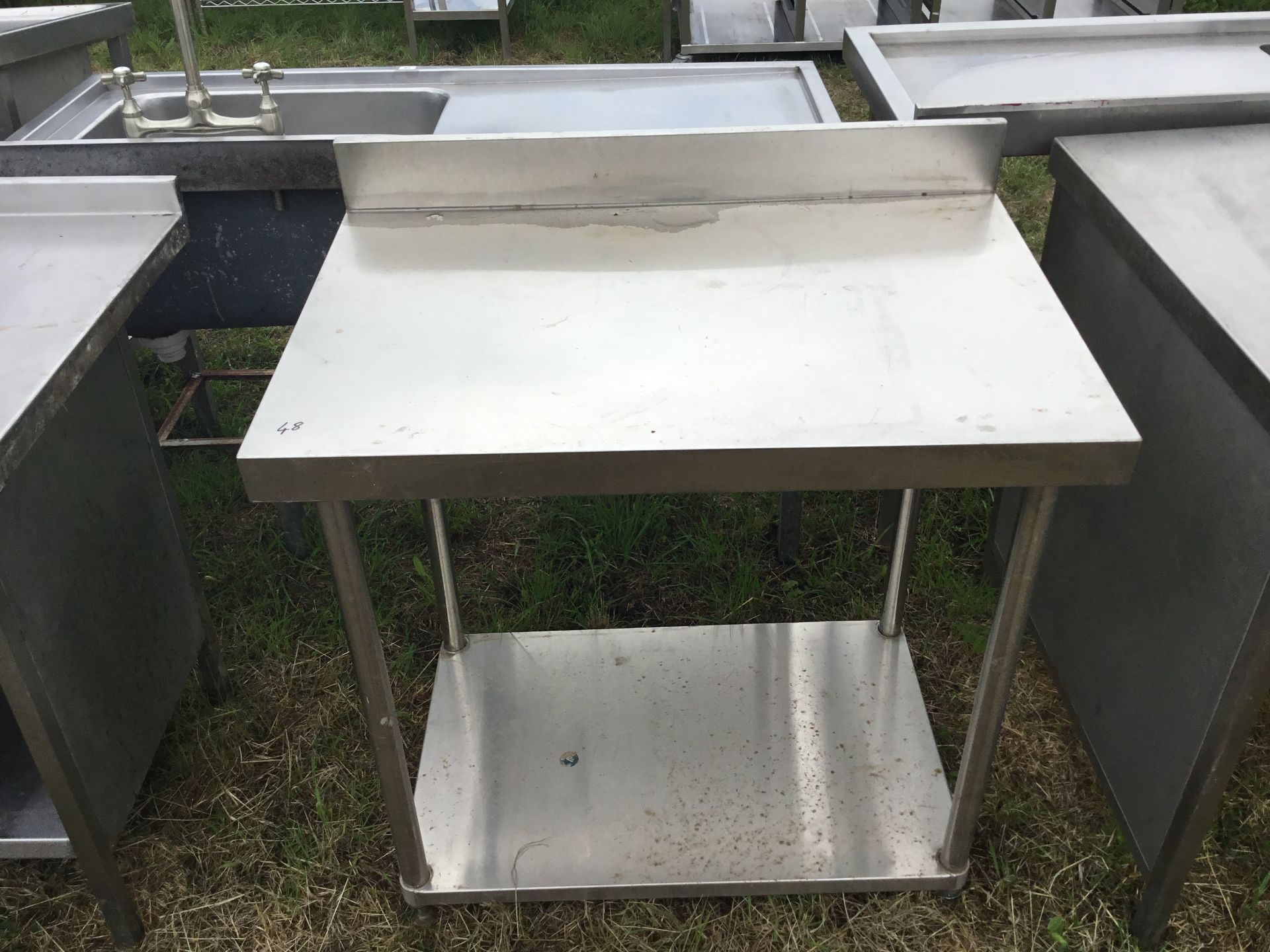 Stainless steel table, 900mm x 600mm x 90mm