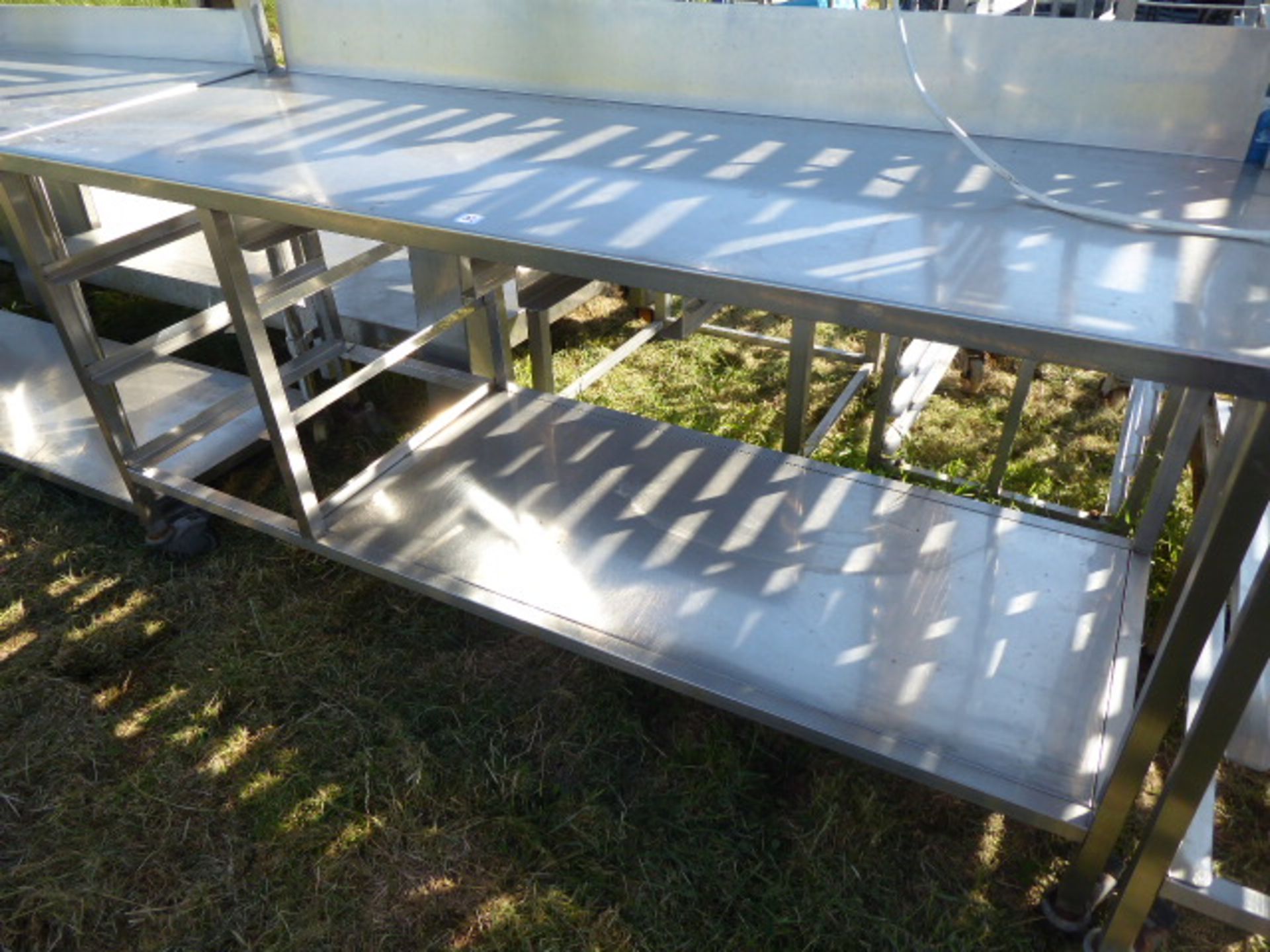 Stainless steel mobile food preparation station with 2 shelves over, shelf under space for trays, - Image 3 of 3