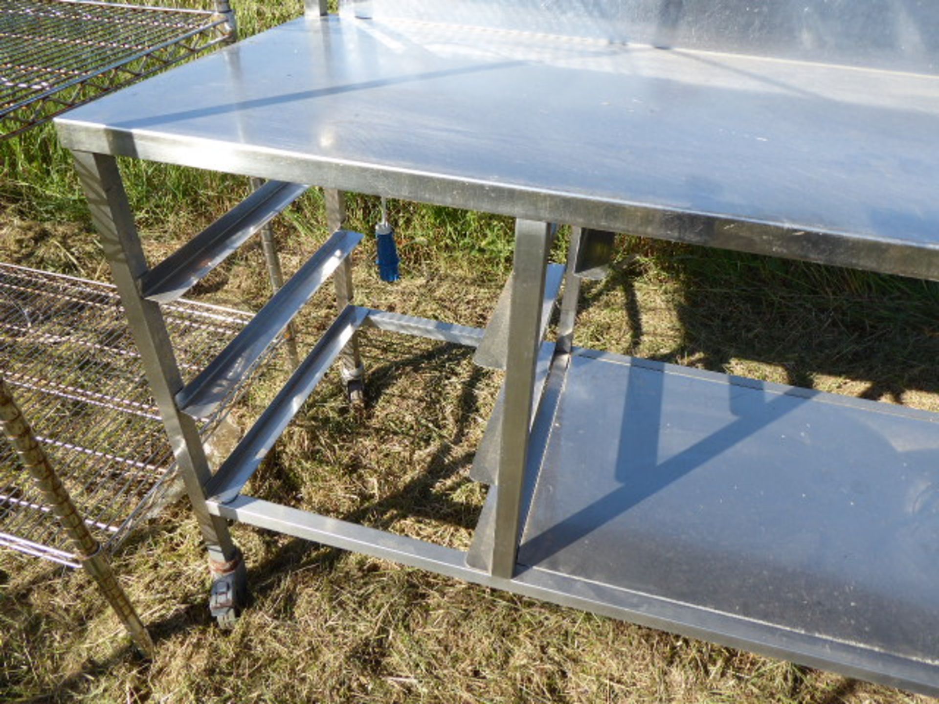 Stainless steel mobile food preparation station with 2 shelves over, shelf under space for trays, - Image 3 of 3