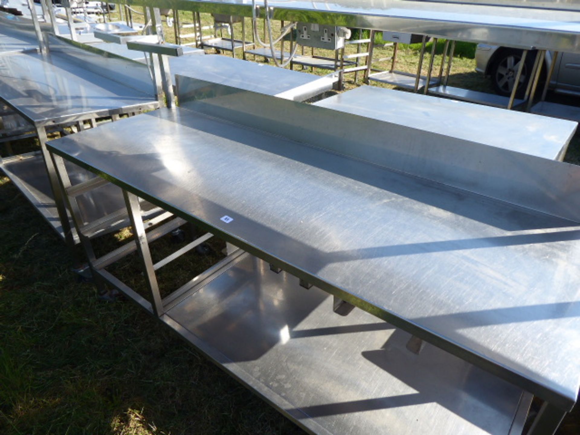 Stainless steel mobile food preparation station with 2 shelves over, shelf under space for trays, - Image 2 of 3