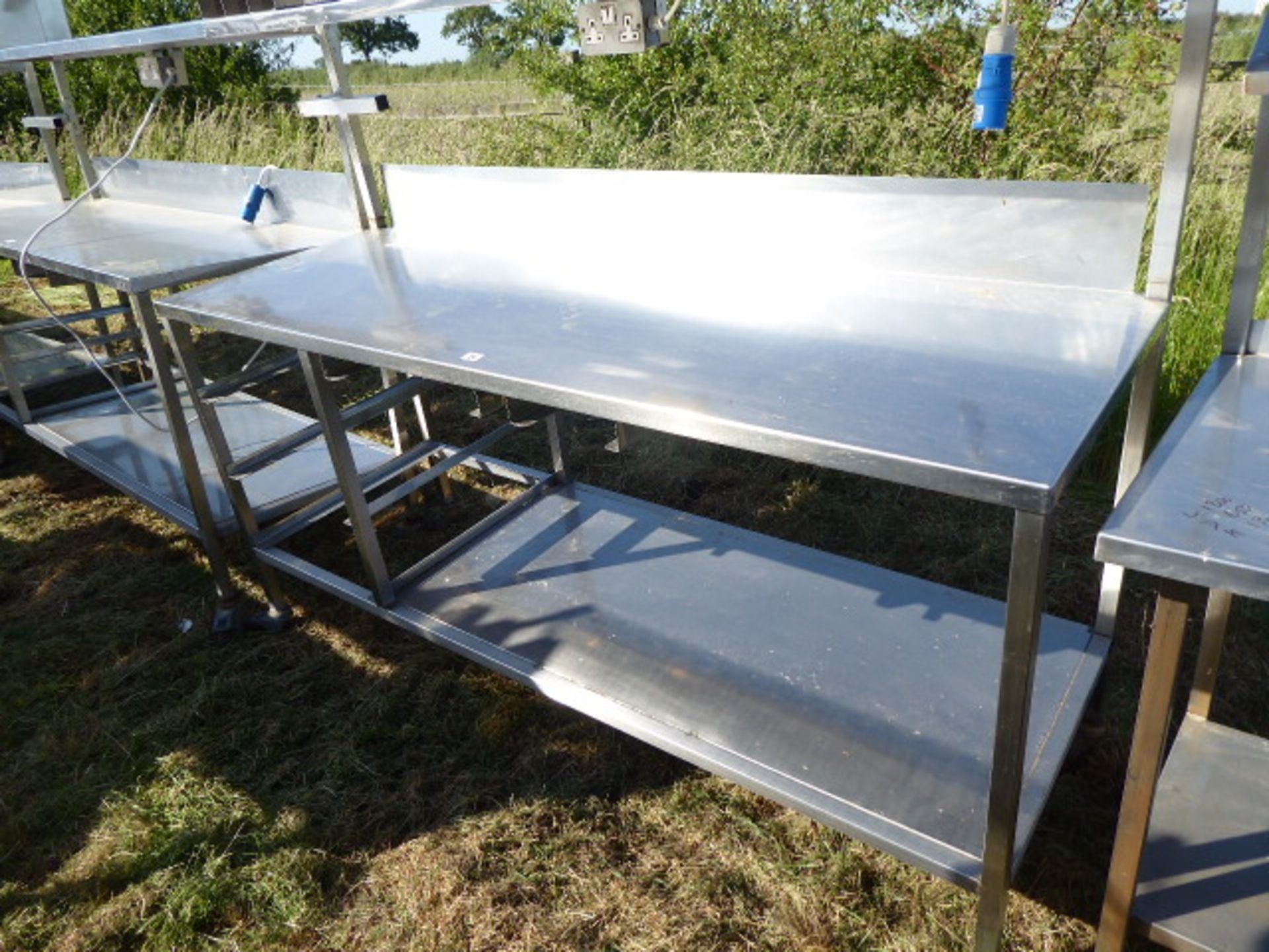 Stainless steel mobile food preparation station with 2 shelves over, shelf under space for trays, - Image 2 of 3