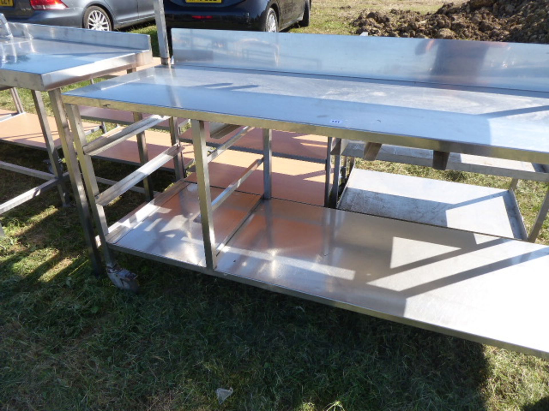 Stainless steel mobile food preparation station with 2 shelves over, shelf under space for trays, - Image 2 of 2