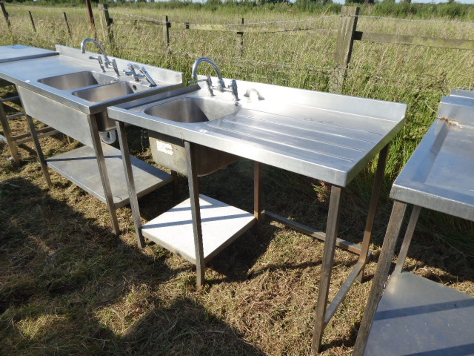 Stainless steel single sink with tap set, draining board, void for dishwasher under and shelf under,