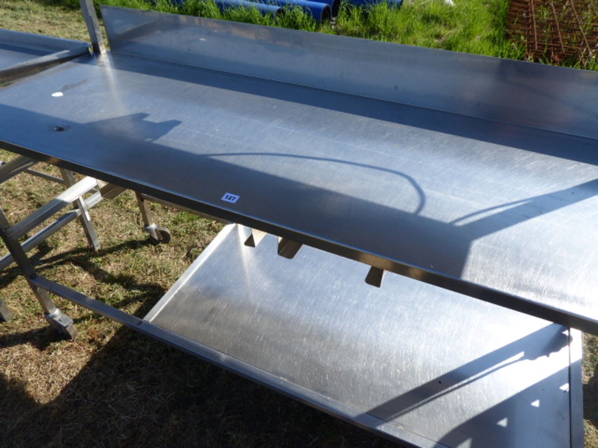 Stainless steel mobile food preparation station with 2 shelves over, shelf under space for trays, - Image 2 of 3