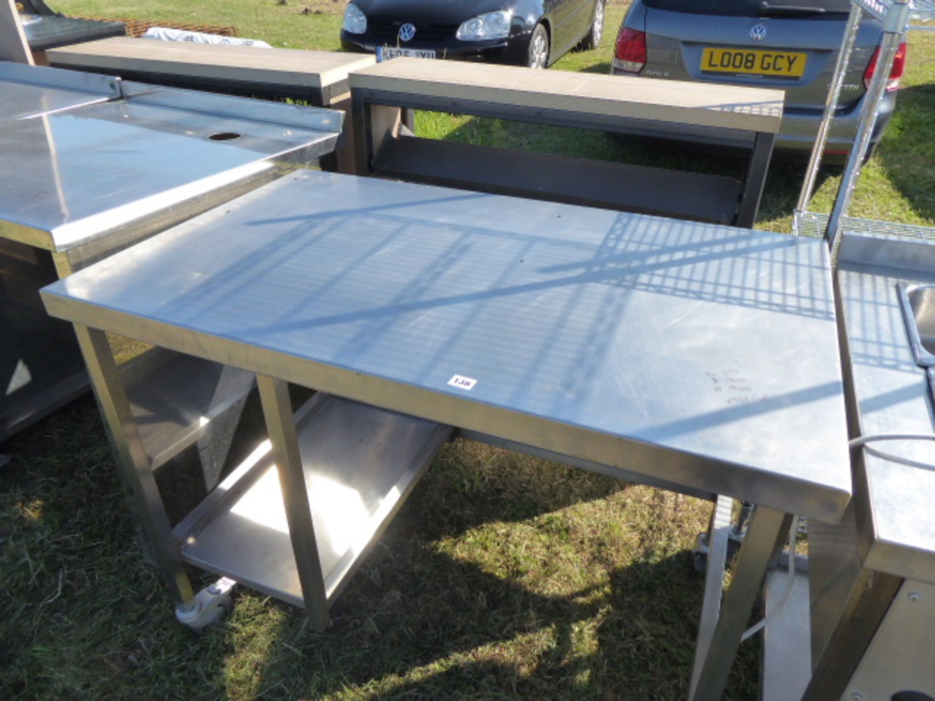 Mobile stainless steel preparation table with void under and shelf under, 1150mm wide, 700mm deep