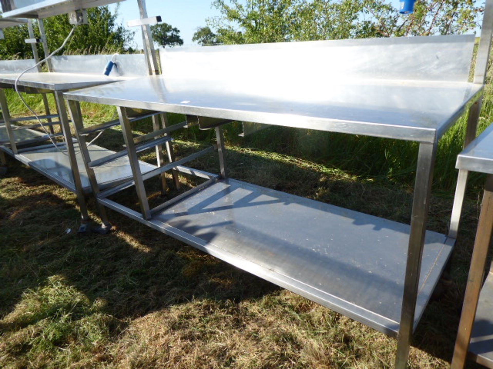 Stainless steel mobile food preparation station with 2 shelves over, shelf under space for trays, - Image 3 of 3