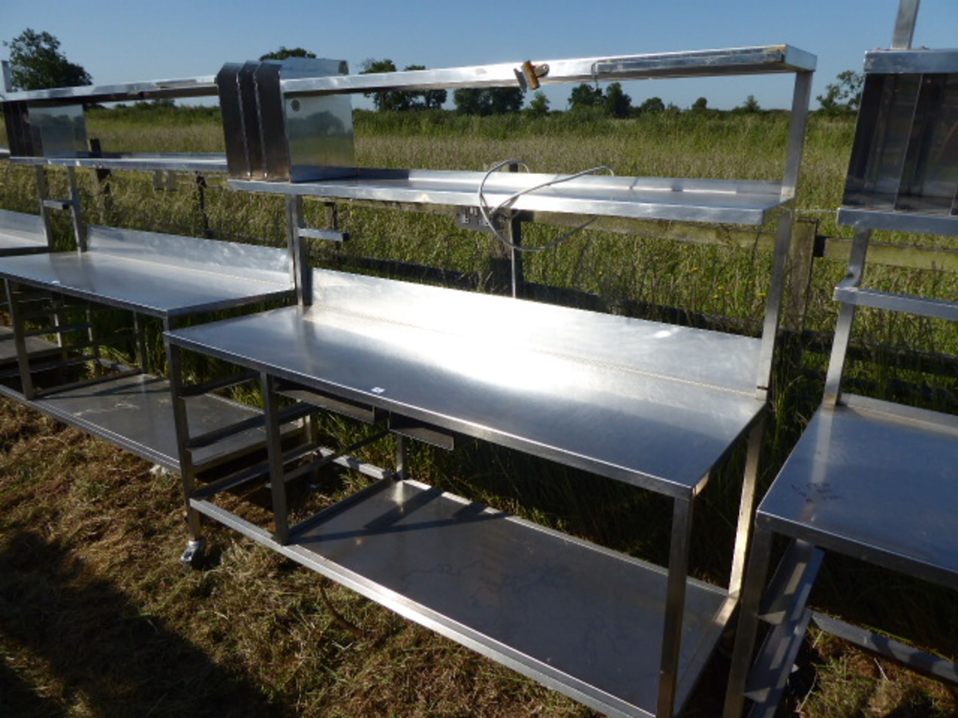 Stainless steel mobile food preparation station with 2 shelves over, shelf under space for trays, - Image 2 of 2