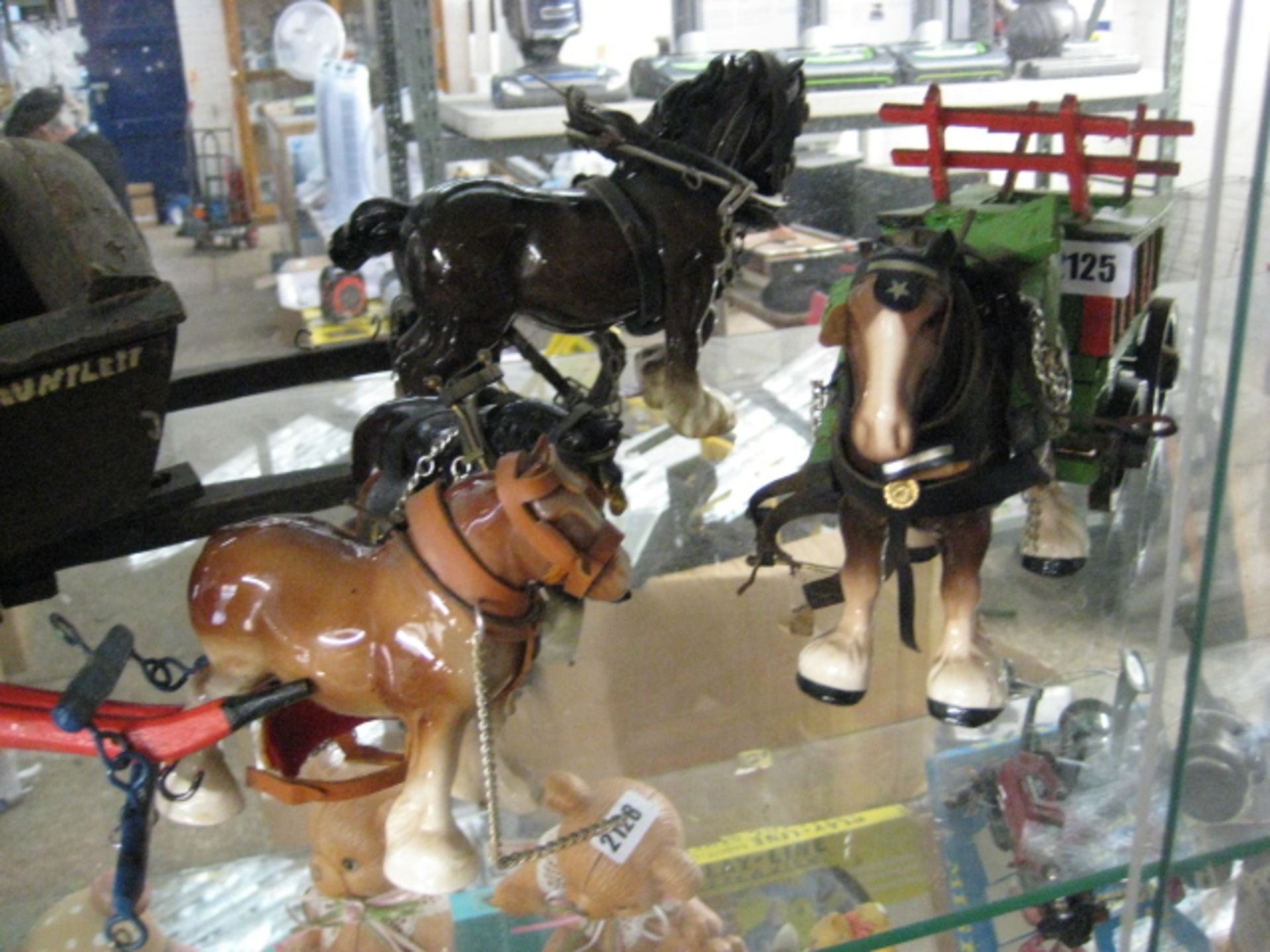 Collection of ceramic horses and carts