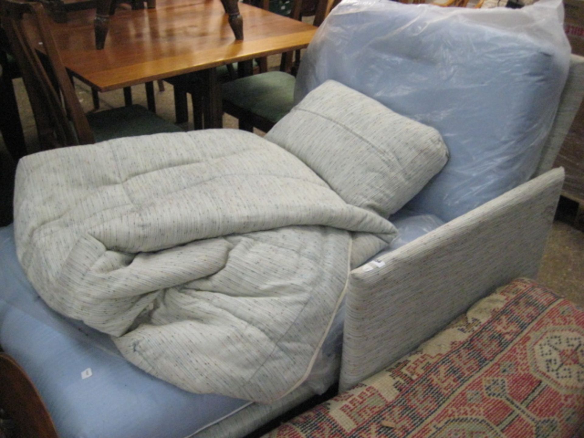 Grey and blue futon chair