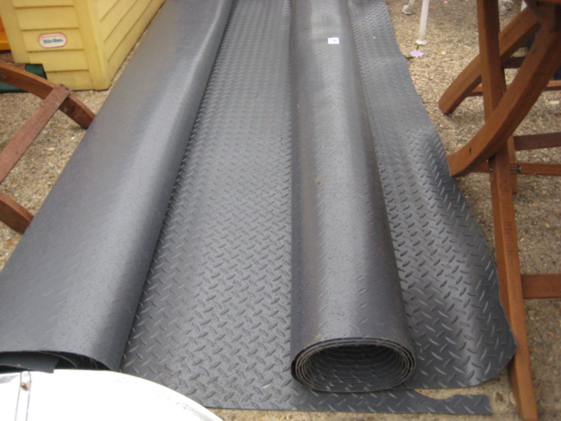 2 rolls of heavy duty vinyl flooring