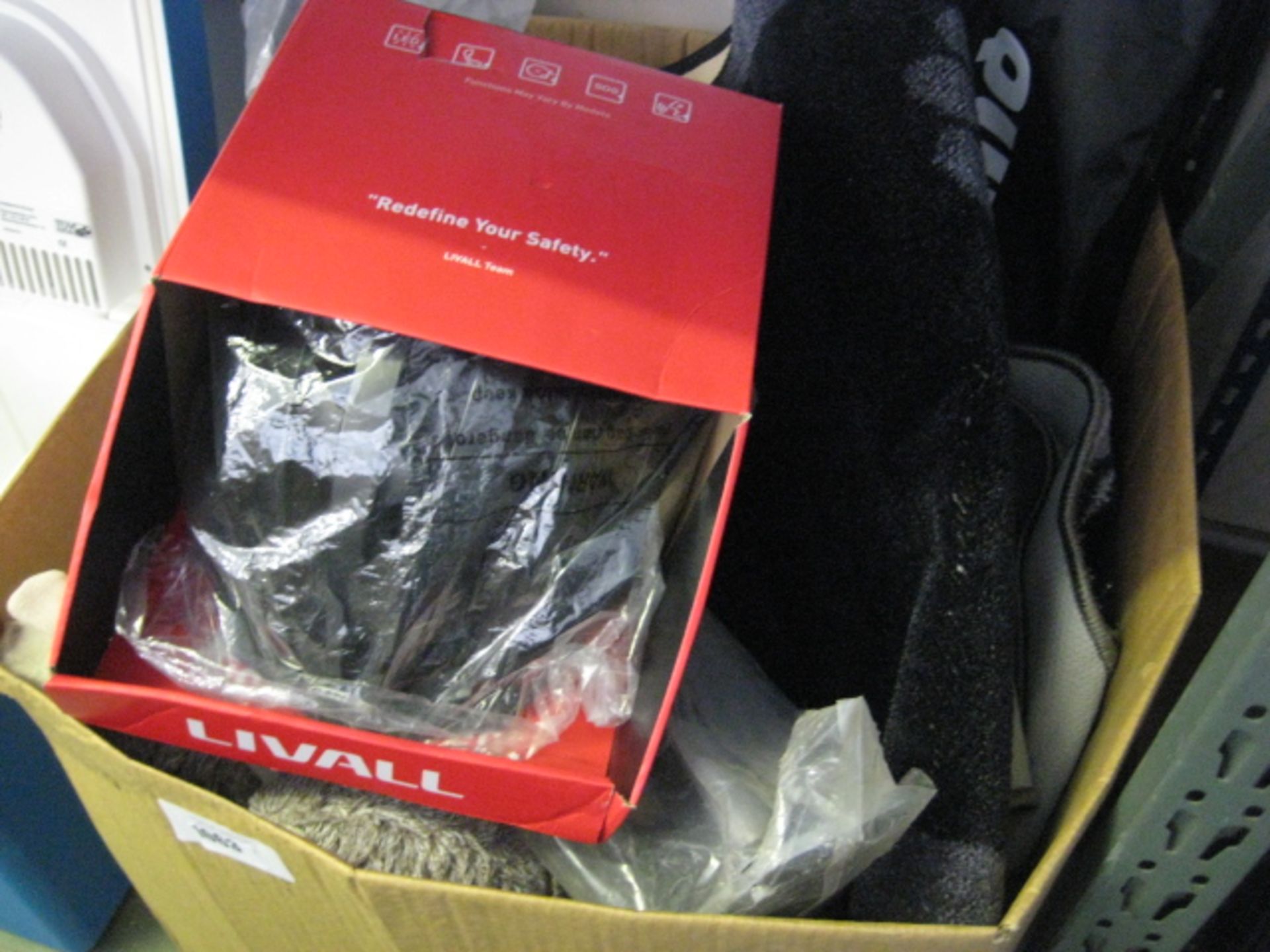 Large box containing mixed outdoor items incl. bike helmets, football, basketball, pump, etc.