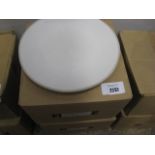 2 boxes containing round white dinner plates